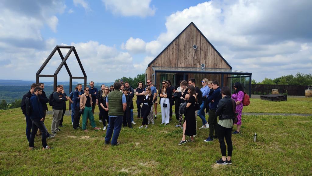 Group briefing outside a Polish winery during a countryside excursion — FORTravels DMC Poland